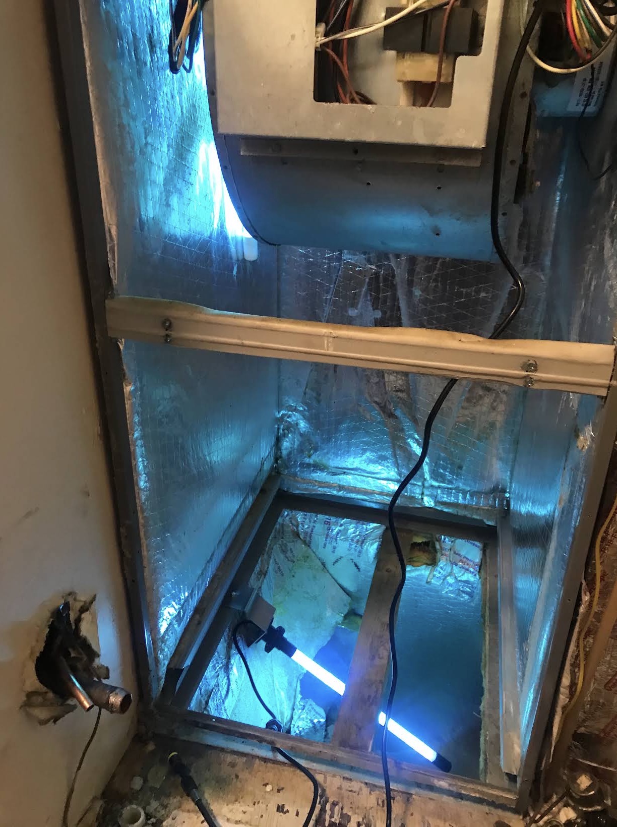 UV purification light installed inside an air handler