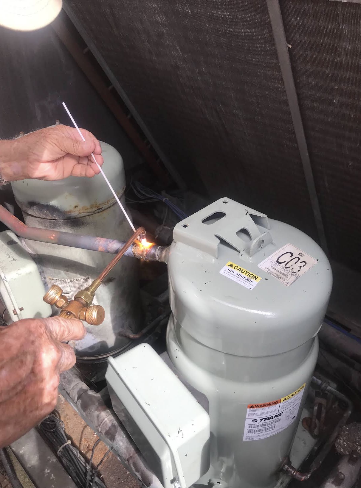 Brazing a new compressor line set on a Trane unit